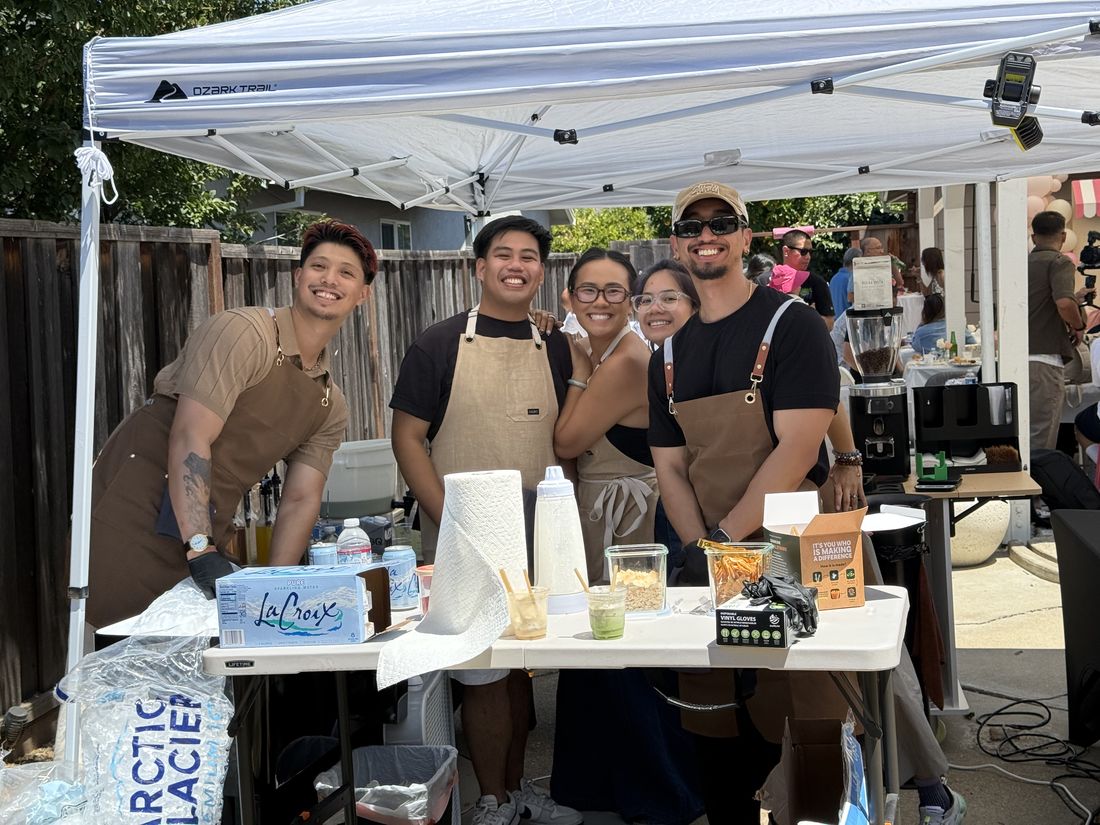 The crew behind the cart at a backyard event