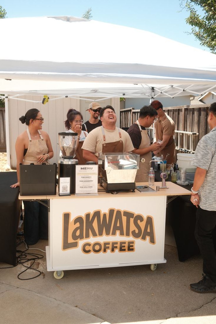 The Lakwatsa cart set up outdoors under a canopy with guests in line